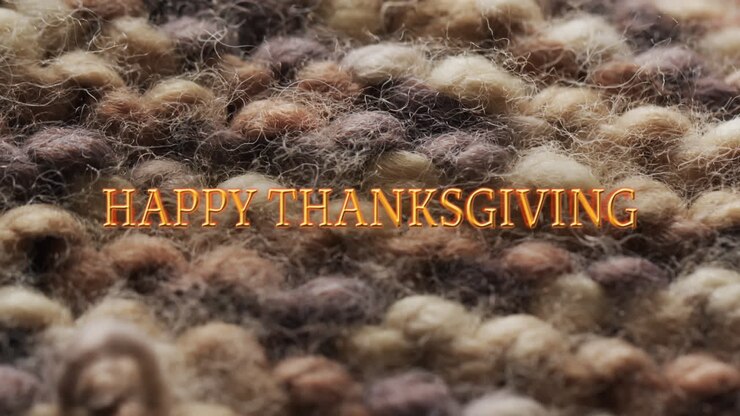 Animation of happy thanksgiving text over wool pattern background