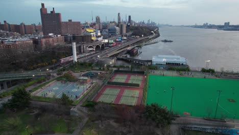 urban sports courts and rec facilities in nyc, aerial with downtown manhattan