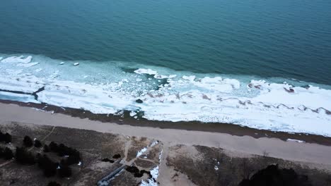 Parallax-4K-drone-video-of-a-beach-with-frozen-shoreline