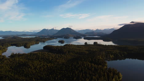 Picturesque-aerial-of-Clayoquot-Sound-with-rainforest-and-mountains,-Tofino