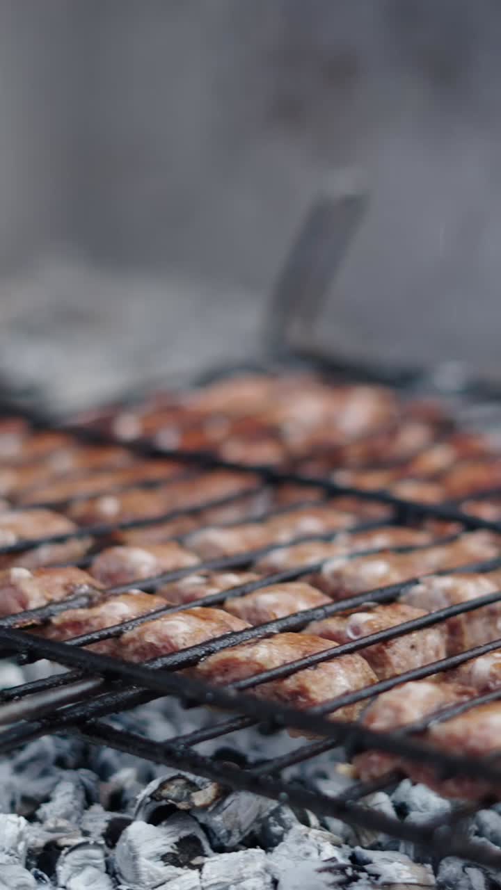 Grilled Sausages on a Charcoal Barbecue