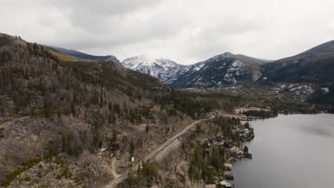 Drone-of-Ptarmigan-Mountain-from-Grand-Lake-Colorado,-camera-moving-over-lake