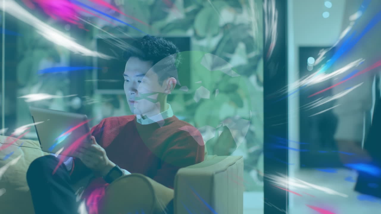 animación del globo y los rastros de luz sobre el hombre de negocios usando la tableta