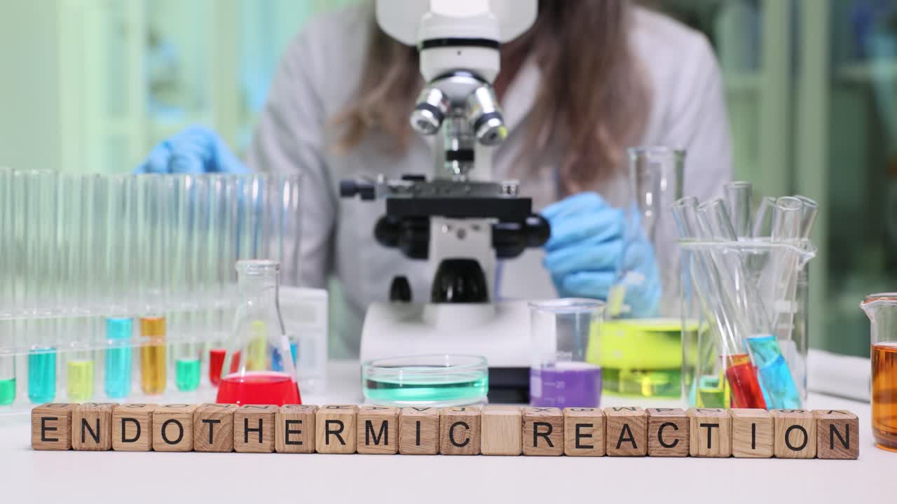 Endothermic Reaction Experiment in a Science Lab with Microscope and Test Tubes