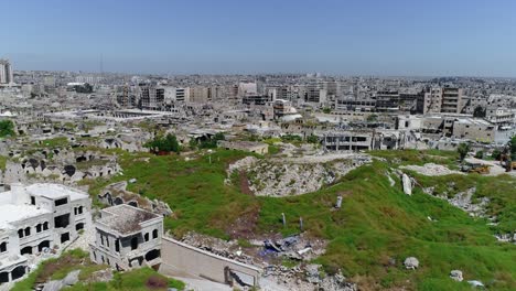 drone flying over the ancient city in the middle of aleppo in syria. we still can see buildings destroyed even 10 years after the war 4k