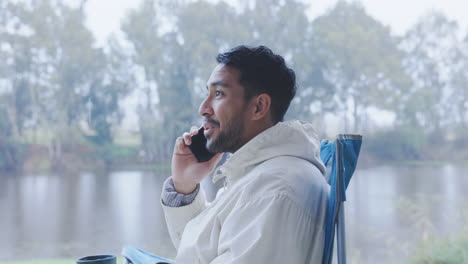 happy man, camping and phone call in nature