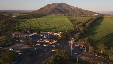 traffic along joint national roads near tuxpan in jalisco, mexico during sunset