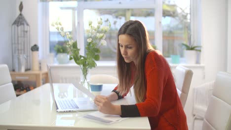 woman sorting through documents