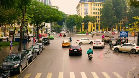 hanoi, vietnam - april, 2020: aerial drone view of the road and roundabout near opera house in the city centre of hanoi.