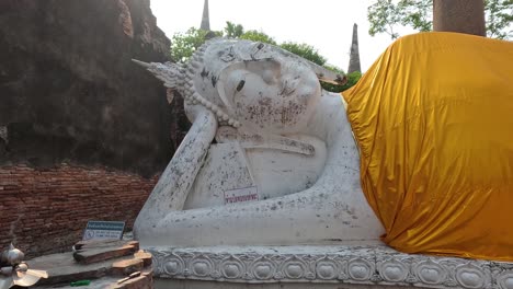 static view of a large reclining buddha statue