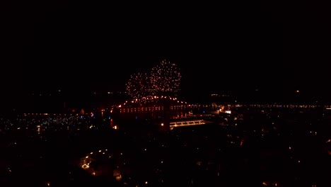 Fireworks-burst-over-Venice-at-night,-illuminating-the-Carnival-with-vibrant-colors