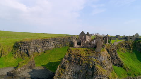 dunluce castle lower eye level track from right to left above sea