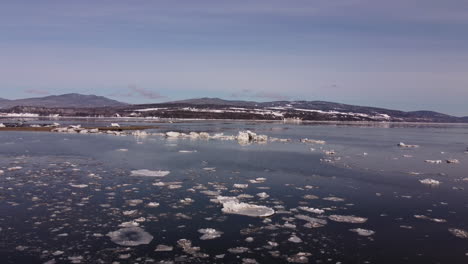 iced river aerial view in la malbaie charlevoix quebec canada