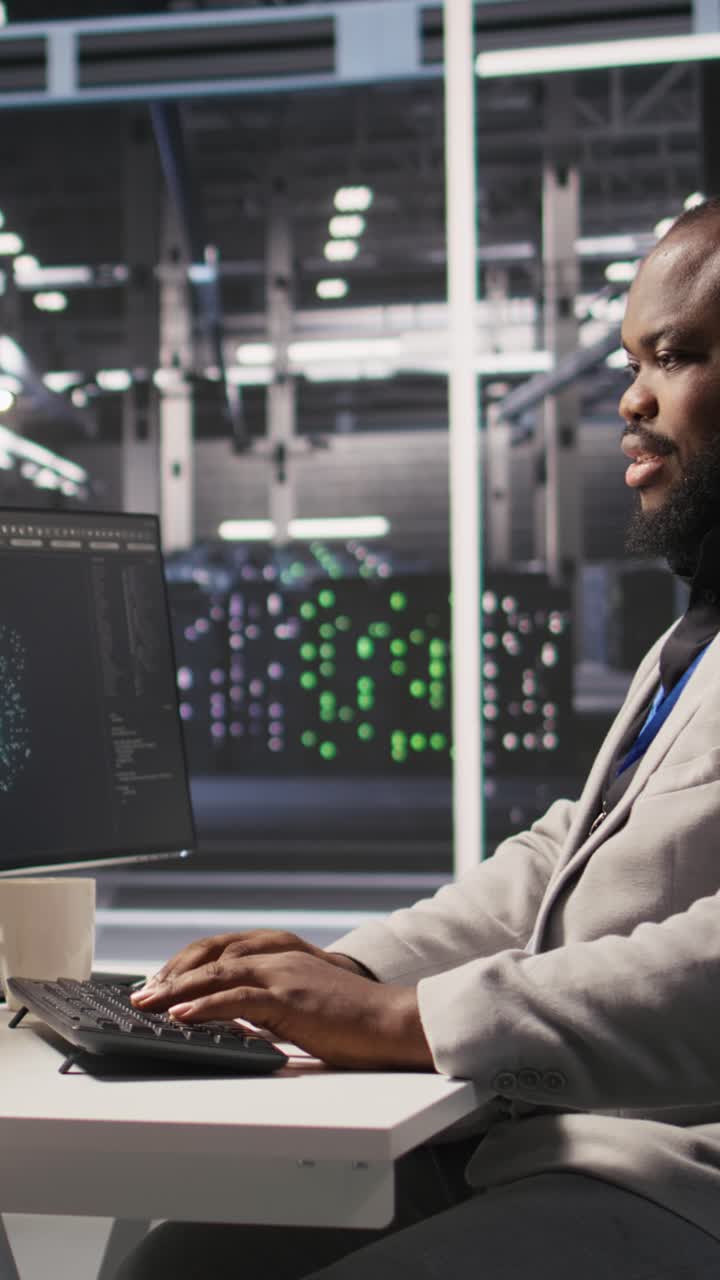 Vertical video Joyous data center software developer delighted after solving all computer bugs