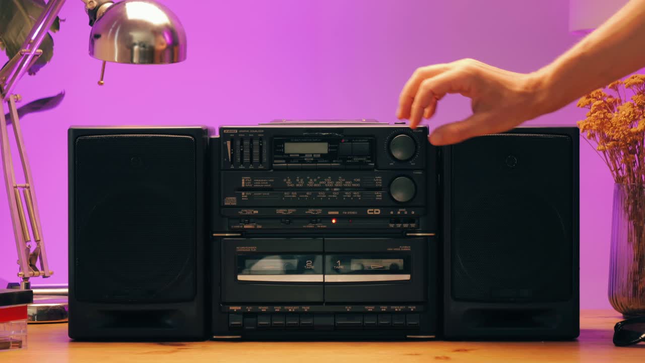 Retro radio tape recorder, audio cassette close-up. Listening to music, old radio boom box player, macro of vintage music listening. . High quality 4k footage