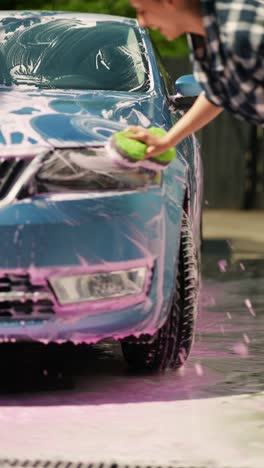 woman washing a car