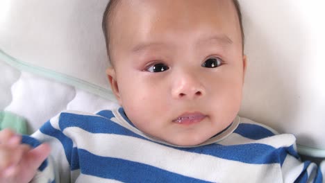 baby looking at camera, video in 4k
