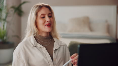 woman working on laptop at home office