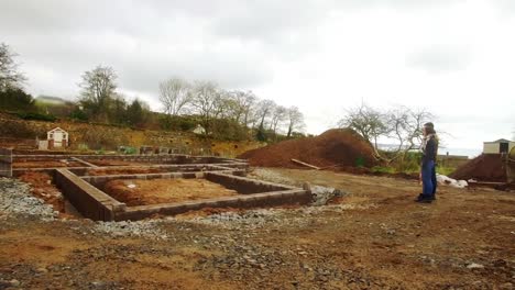 Couple-standing-near-construction-site