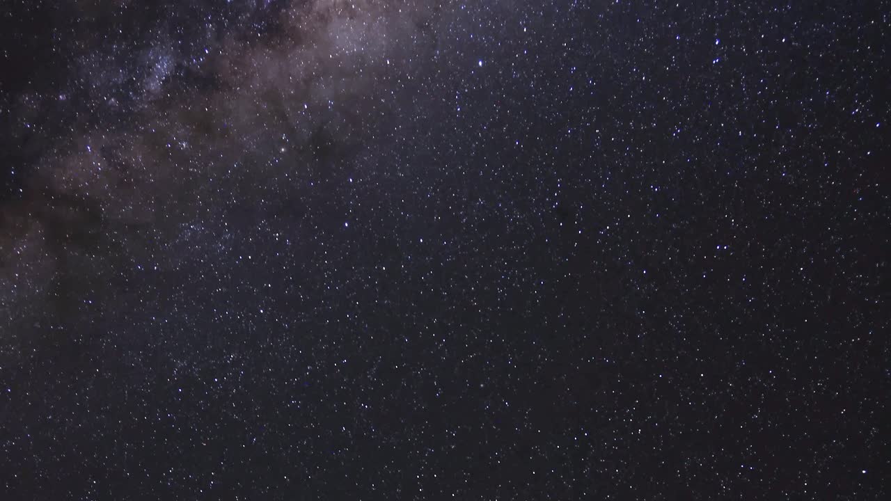 A stunning timelapse of the Milky Way, showcasing the galaxy's vibrant colors and starry expanse in a serene night sky