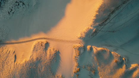 Top-down-timelapse-shot-of-people-walking-through-the-Provincetown-Sand-Dunes