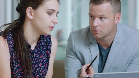 beautiful-business-woman-using-laptop-computer-working-with-businessman-sharing-ideas-colleagues-working-together-in-office-4k