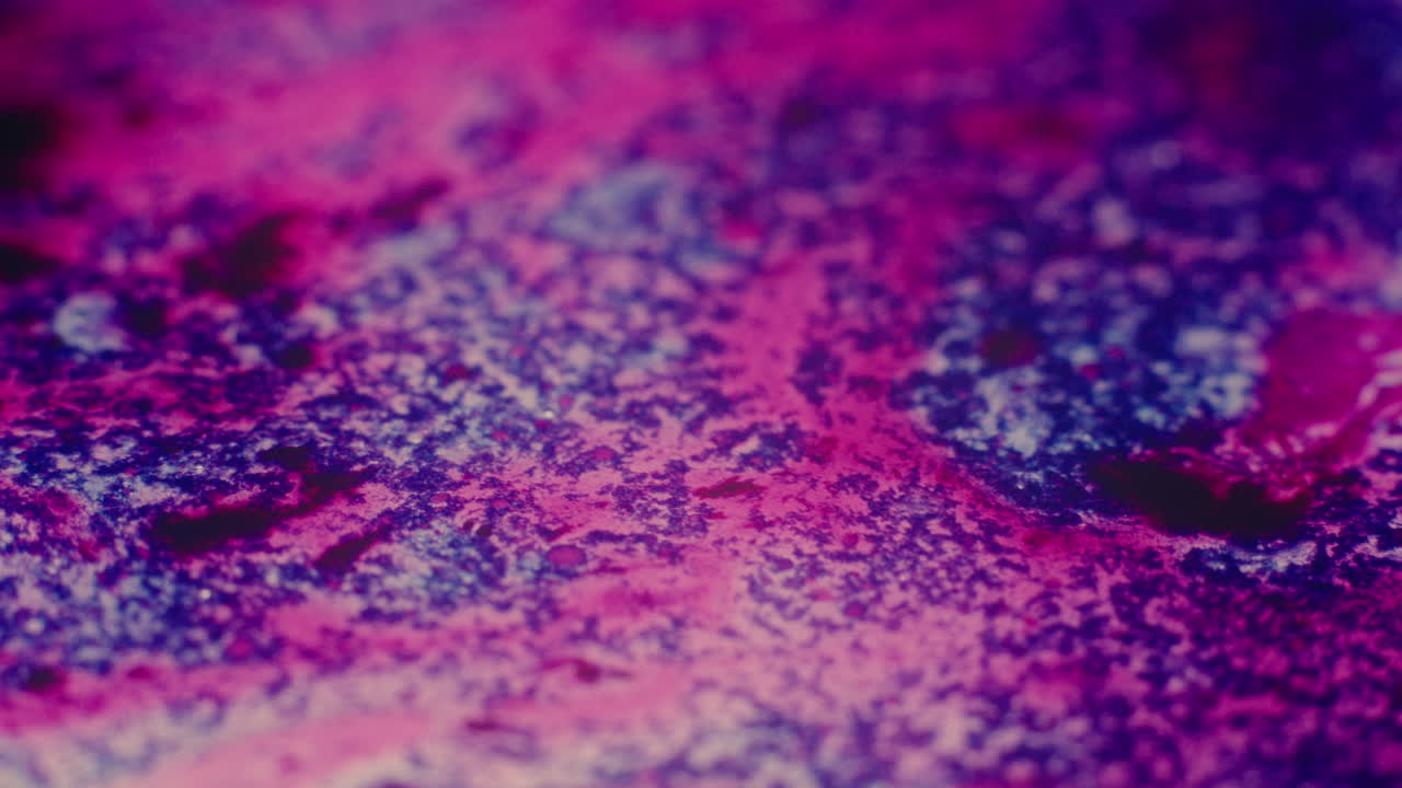 Colourful, organic, liquids macro shots buzzing and flowing