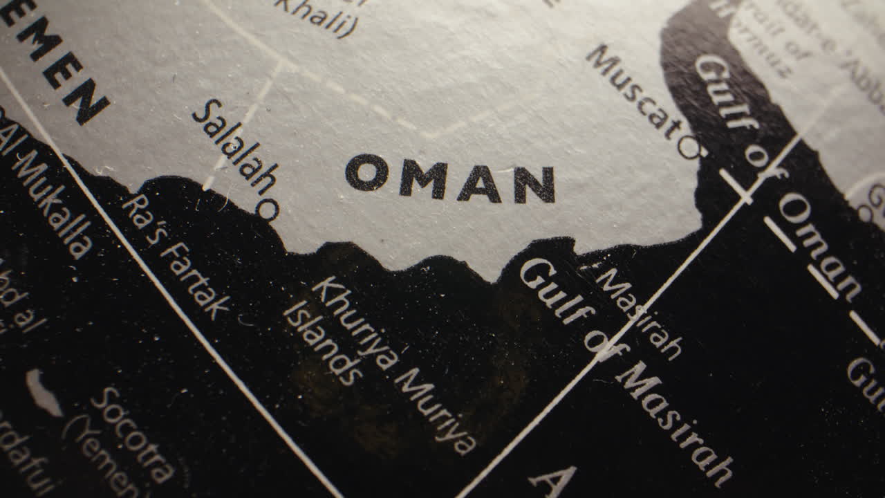 Close-up view of the Middle East region on a globe, focusing on Oman and surrounding countries