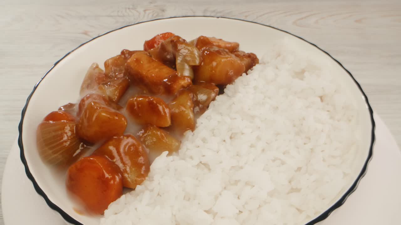 Japanese curry rice with fry pork Tonkatsu, Katsu Kare, Japanese breaded cooking dinner in restaurant, close up macro of asian food