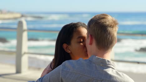 romantic couple kissing each other near railings 4k