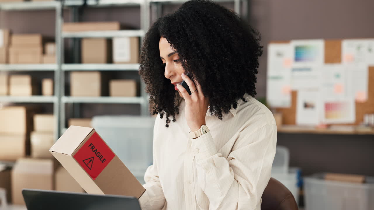 Woman on Phone Call Checking Fragile Package in E-commerce Office