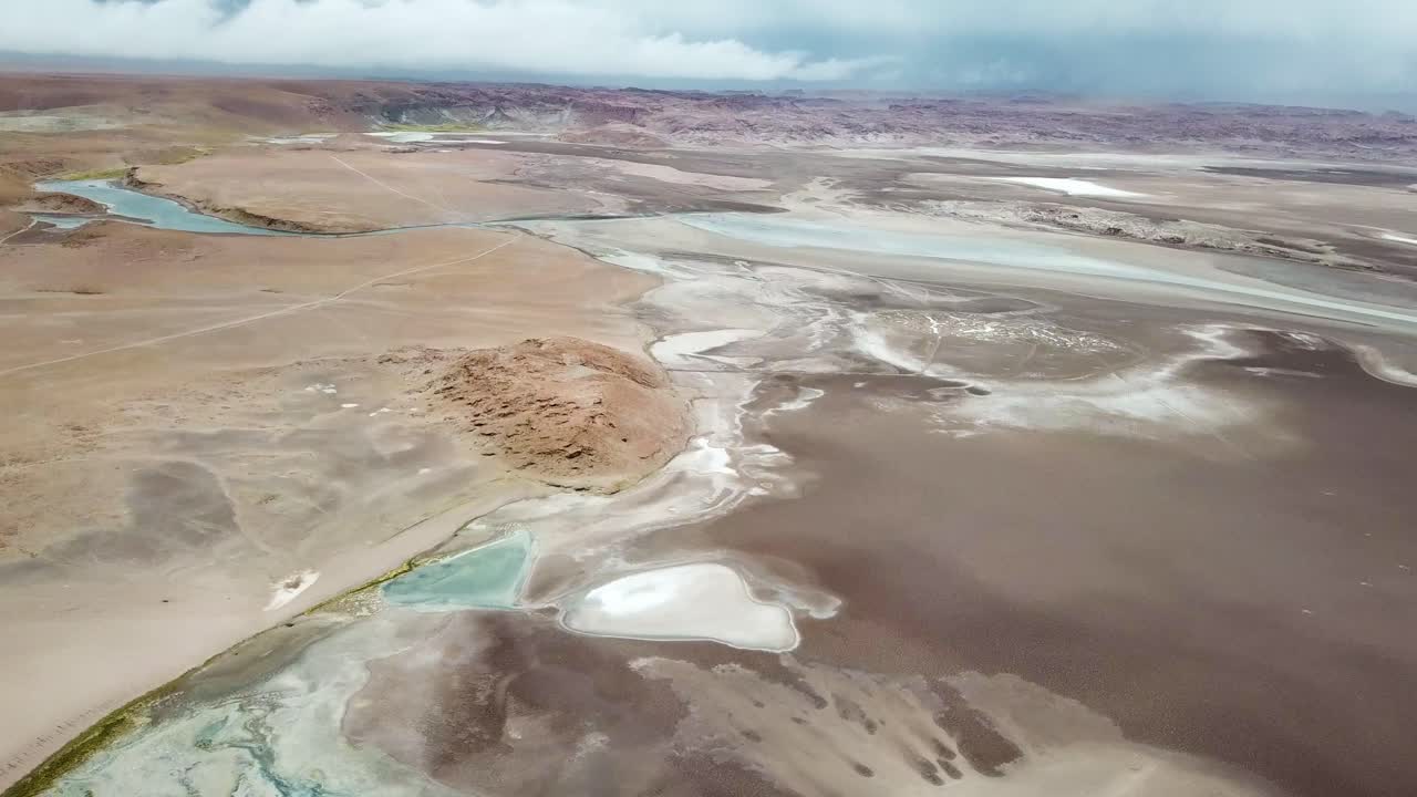 Cinematic Aerial View of Salt Flat and Endless Desert Landscape in Los Flamencos National Reserve, Chile