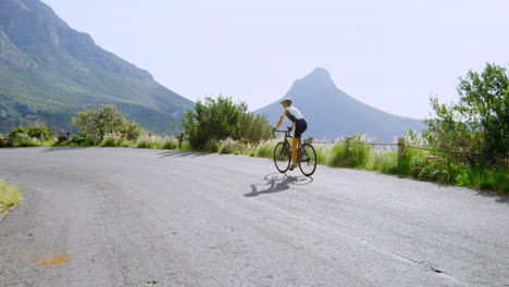 senior cyclist cycling on a road 4k