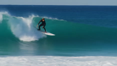 Surfer Riding Ocean Waves