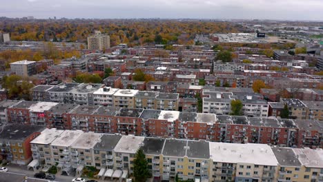 aerial shot over a residential neighbourhood on a cloudy fall day