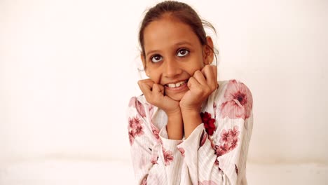 portrait of an indian child at home during coronavirus lockdown