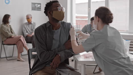 African Man Getting Flu Shot