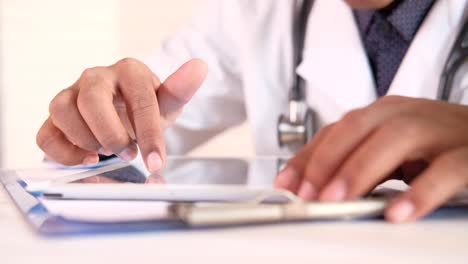 doctor using a tablet