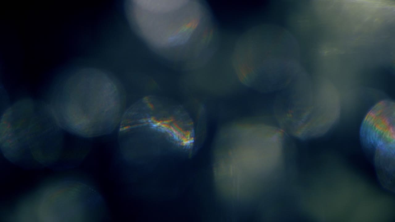 Transizione Overlay Astratta con Fughe di Luce Bokeh Scure
