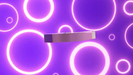 animation of purple magnetic horse shoe spinning over neon circles on purple background