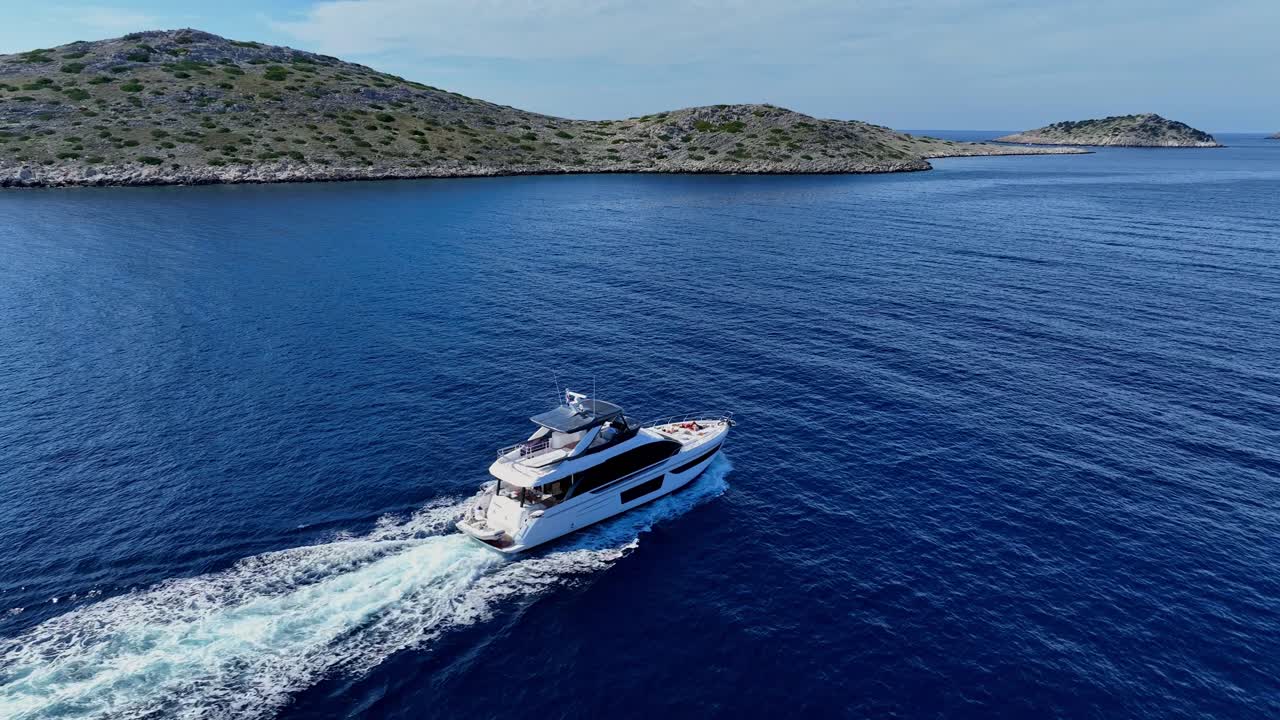 Luxury Yacht Sailing at Sea in Kornati National Park, Sunny Day Aerial