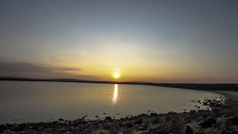 a absolutely perfect holy grail timelapse of gaddins dam in todmorden , sunset to stars coming out