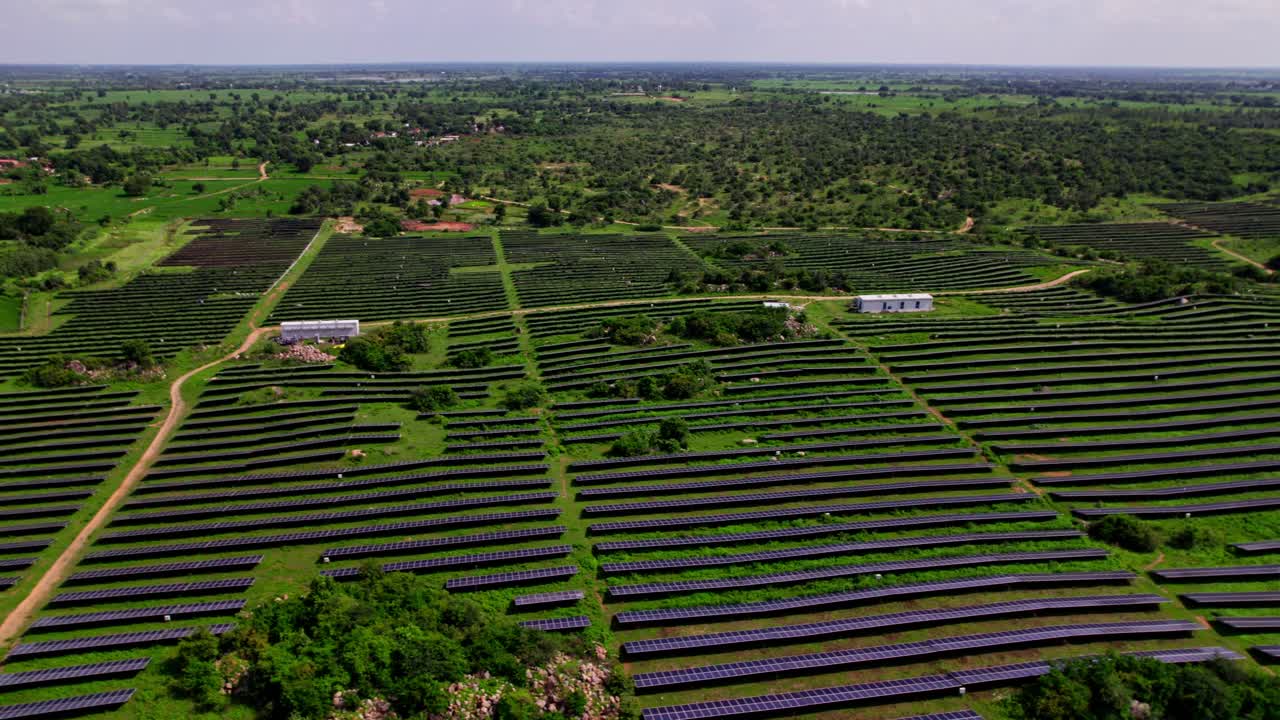 Solar power plant in tekmal village, medak district, telangana, india. 4k, day time, push in and Tilt up, Drone shot.