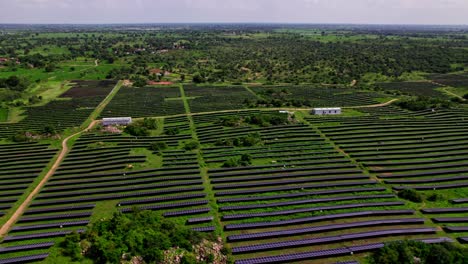Solar power plant in tekmal village, medak district, telangana, india. 4k, day time, push in and Tilt up, Drone shot.