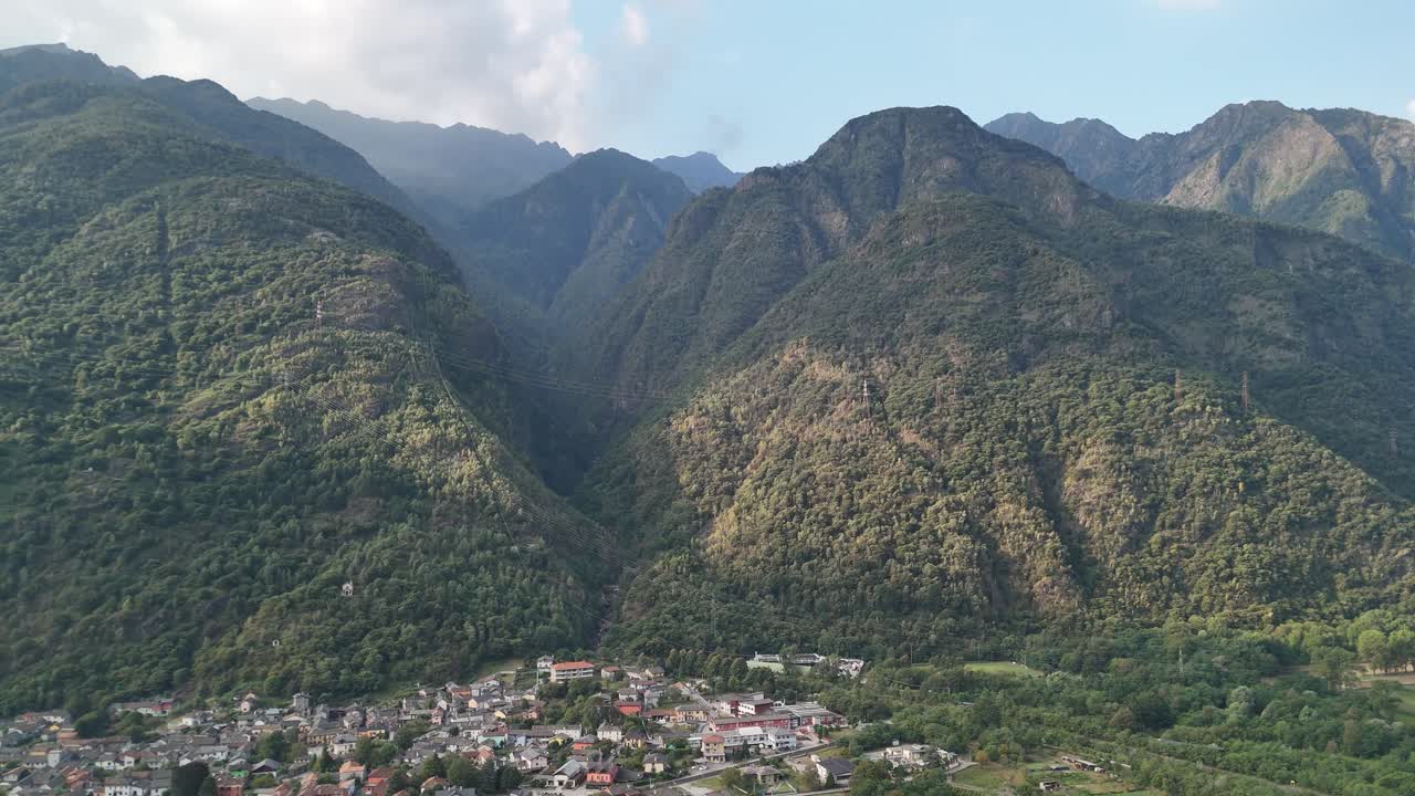 Aerial view of mountains and some city in Italy from a drone