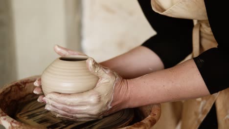 The-Female-Potter-Finished-Making-A-Clay-Vase-Remove-It-From-The-Potter's-Wheel