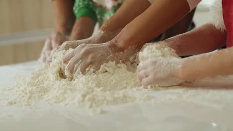 tilt down video shows of family baking cookies for christmas