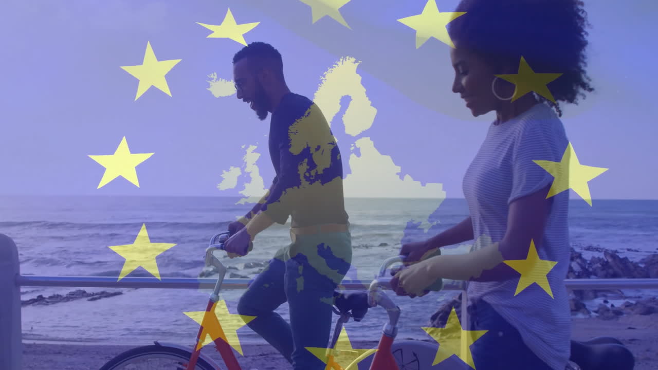 Duas pessoas andando de bicicleta à beira-mar com animação das estrelas da União Europeia.