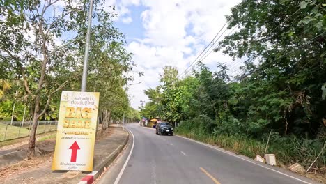 a vehicle's progression along a peaceful road