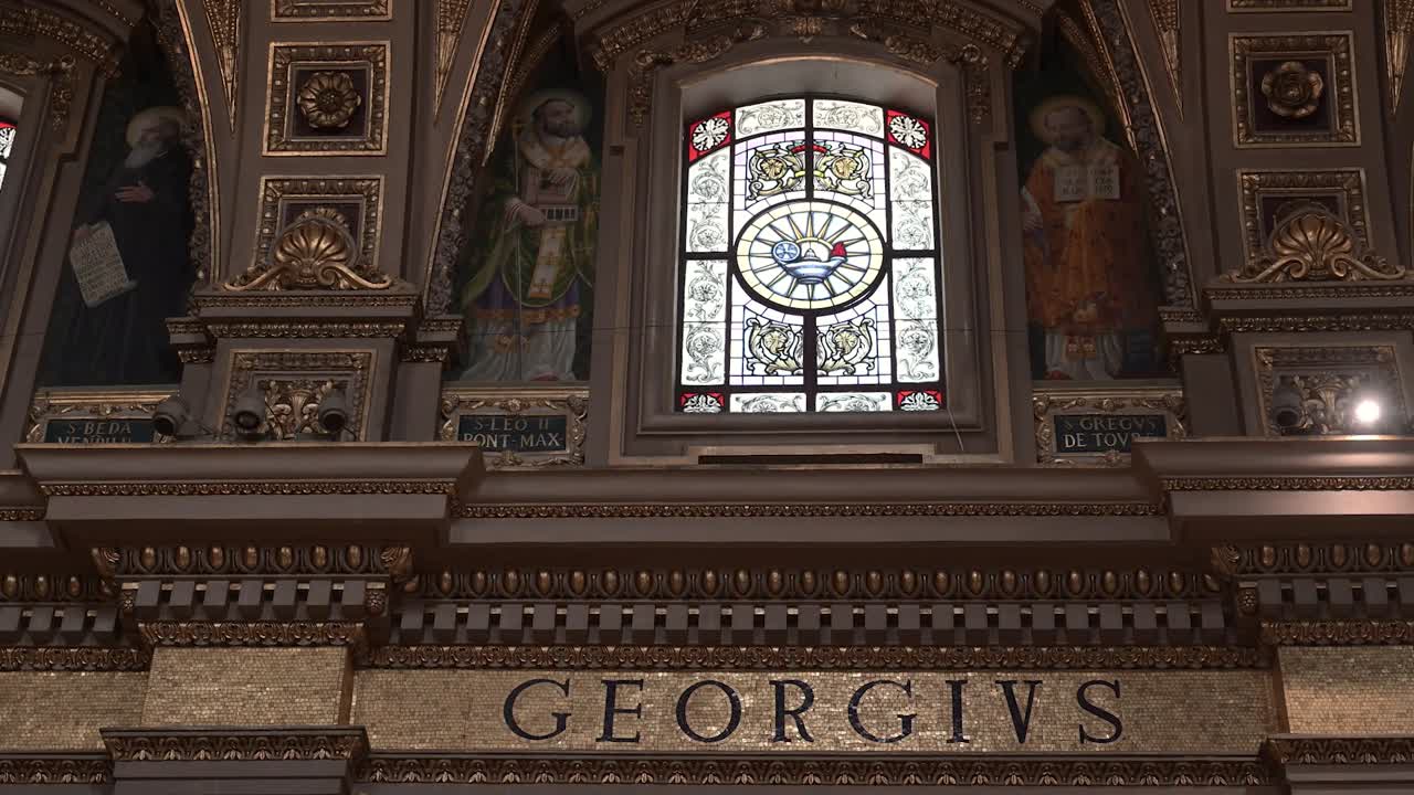 The GeorgIVS inscription stands as a tribute to King George IV, reflecting royal heritage, craftsmanship, and historical significance through detailed stonework